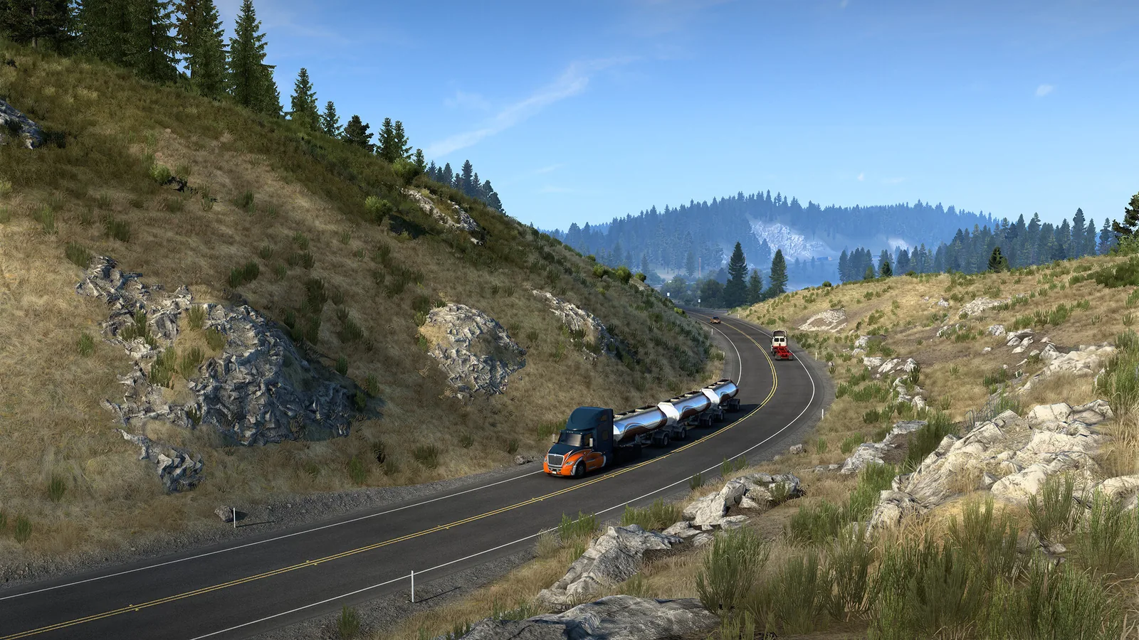 Caminhão com carreta-tanque descendo uma serra sinuosa em rodovia de montanha no American Truck Simulator.